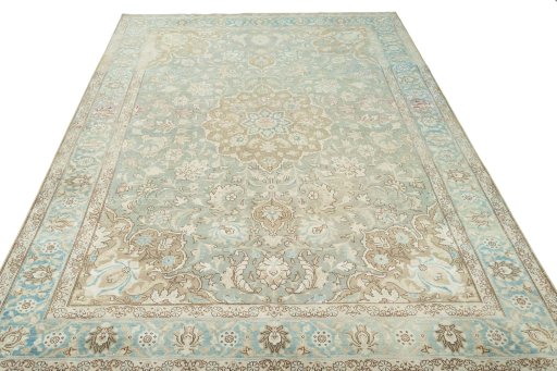 Surface texture of 1950s Tabriz rug with natural Wool and intricate pattern