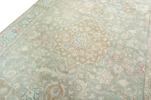 Backside of handmade 1950s Tabriz rug showing knot structure and weave density
