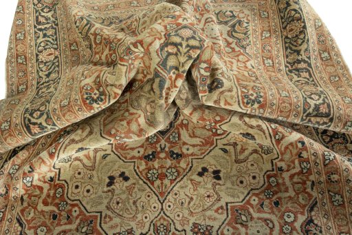 Surface texture of 1930s Tabriz rug with natural Wool and intricate pattern