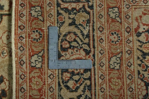 Backside of handmade 1930s Tabriz rug showing knot structure and weave density