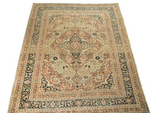 Surface texture of 1930s Tabriz rug with natural Wool and intricate pattern