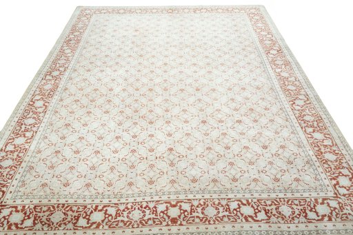 Surface texture of 2000s Tabriz rug with natural Wool and intricate pattern