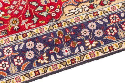 Backside of handmade 1980s Tabriz rug showing knot structure and weave density