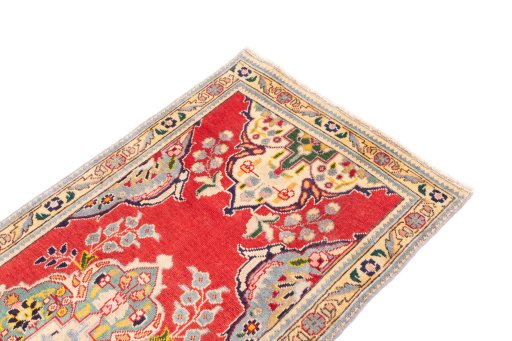 Surface texture of 2003s Tabriz rug with natural Wool and intricate pattern