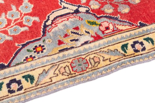 Backside of handmade 2003s Tabriz rug showing knot structure and weave density