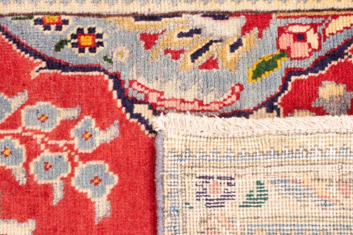 Close-up detail of 2003s Tabriz rug from Iran / Persia showing Wool weave