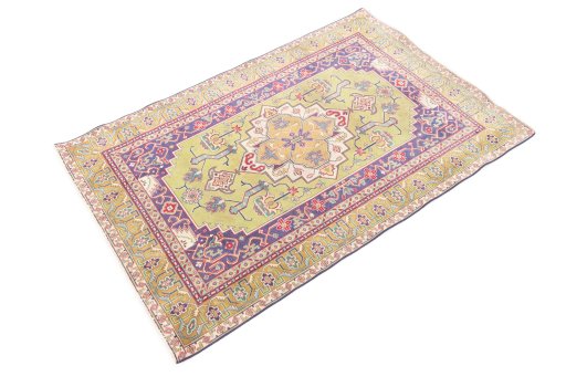 Corner detail of 1980s Tabriz rug showing border pattern and Wool pile