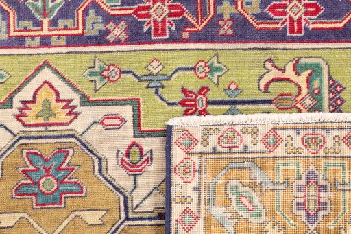 Close-up detail of 1980s Tabriz rug from Iran / Persia showing Wool weave