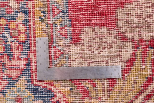 Corner detail of 1940s Tabriz rug showing border pattern and Wool pile