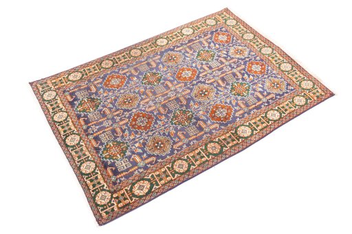 Corner detail of 1970s Tabriz rug showing border pattern and Wool pile