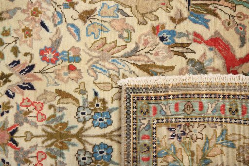 Close-up detail of 2000s Tabriz rug from Iran / Persia showing Wool weave