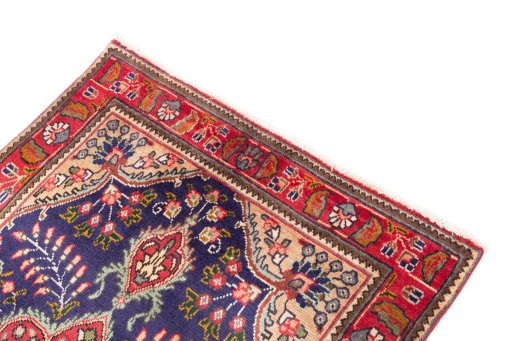Surface texture of 1996s Tabriz rug with natural Wool and intricate pattern