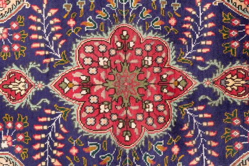 Full view of 1996s Tabriz rug from Iran / Persia, 138 × 95 cm in Dark blue tones