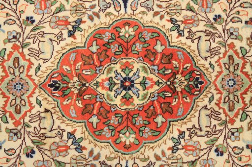 Corner detail of 1990s Tabriz rug showing border pattern and Wool pile