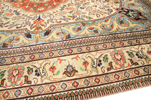 Backside of handmade 1990s Tabriz rug showing knot structure and weave density