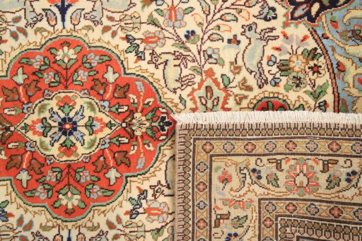 Full view of 1990s Tabriz rug from Iran / Persia, 195 × 145 cm in Cream tones