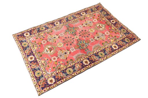 Close-up detail of 1980s Tabriz rug from Iran / Persia showing Wool weave