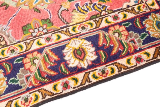 Backside of handmade 1980s Tabriz rug showing knot structure and weave density