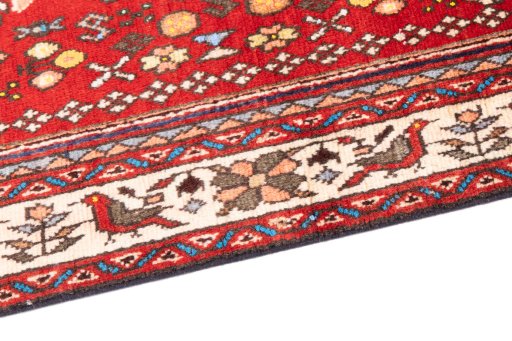 Backside of handmade 1973s Tabriz rug showing knot structure and weave density