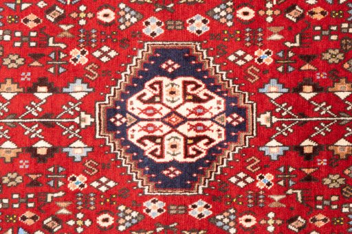 Full view of 1973s Tabriz rug from Iran / Persia, 148 × 104 cm in Red tones