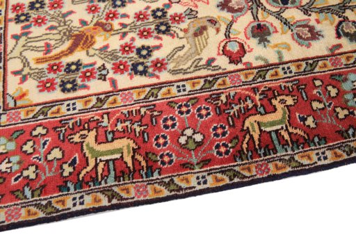 Backside of handmade 1980s Tabriz rug showing knot structure and weave density