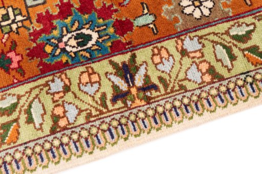 Backside of handmade 1999s Tabriz rug showing knot structure and weave density
