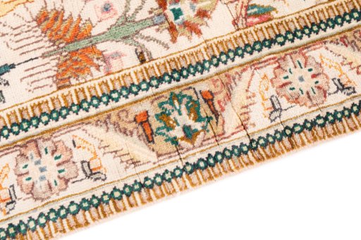Backside of handmade 1975s Tabriz rug showing knot structure and weave density