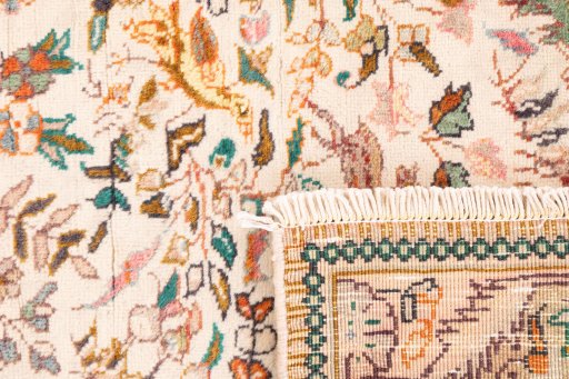 Close-up detail of 1975s Tabriz rug from Iran / Persia showing Wool weave
