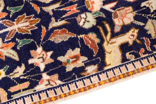 Backside of handmade 1980s Tabriz rug showing knot structure and weave density