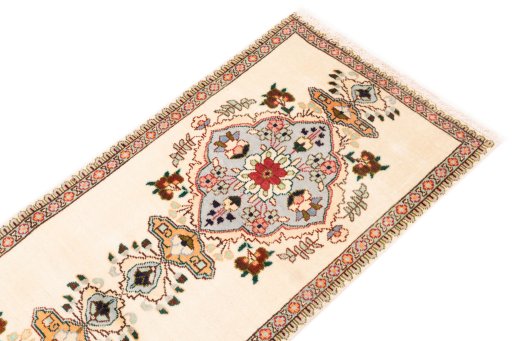 Surface texture of 1985s Tabriz rug with natural Wool and intricate pattern