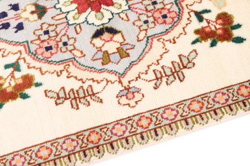 Backside of handmade 1985s Tabriz rug showing knot structure and weave density