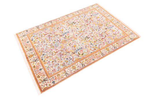 Corner detail of 2003s Tabriz rug showing border pattern and Wool pile