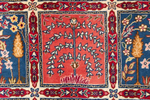 Corner detail of 2005s Tabriz rug showing border pattern and Wool pile