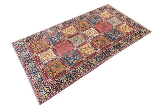 Close-up detail of 2005s Tabriz rug from Iran / Persia showing Wool weave
