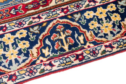 Backside of handmade 2005s Tabriz rug showing knot structure and weave density