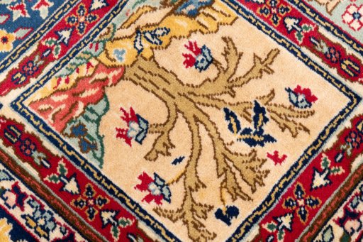 Close-up detail of 2005s Tabriz rug from Iran / Persia showing Wool weave