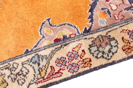 Backside of handmade 2004s Tabriz rug showing knot structure and weave density