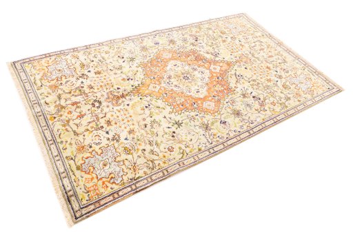 Corner detail of 1978s Tabriz rug showing border pattern and Wool pile