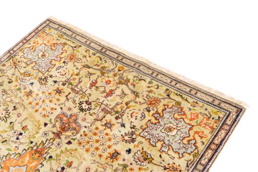 Surface texture of 1978s Tabriz rug with natural Wool and intricate pattern
