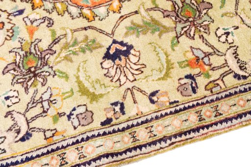 Backside of handmade 1978s Tabriz rug showing knot structure and weave density