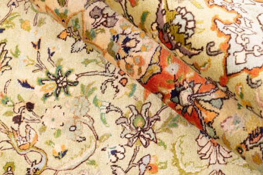 Corner detail of 1978s Tabriz rug showing border pattern and Wool pile