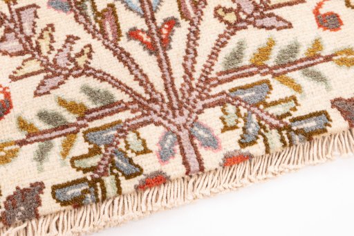 Backside of handmade 2008s Tabriz rug showing knot structure and weave density