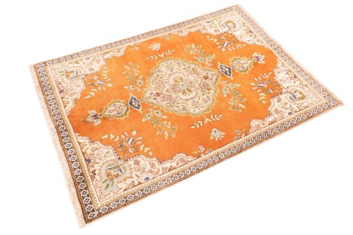 Corner detail of 2006s Tabriz rug showing border pattern and Wool pile