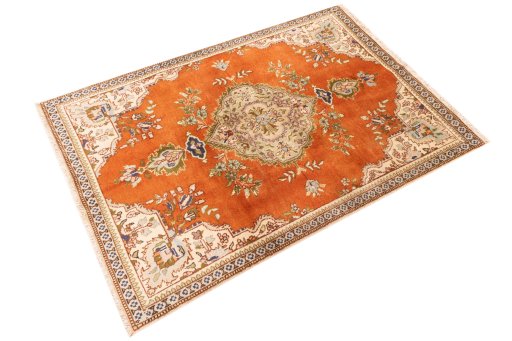 Close-up detail of 2006s Tabriz rug from Iran / Persia showing Wool weave