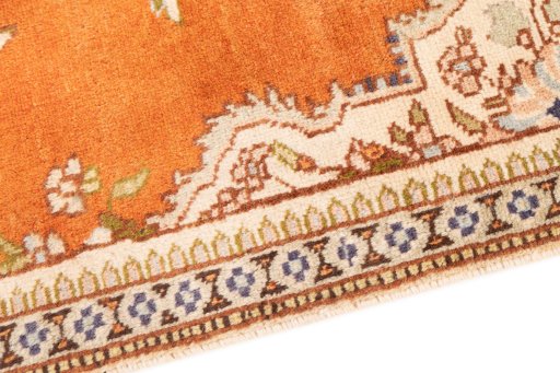 Backside of handmade 2006s Tabriz rug showing knot structure and weave density