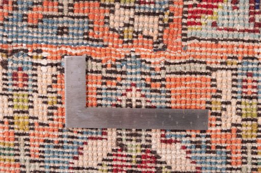 Close-up detail of 1985s Tabriz rug from Iran / Persia showing Wool weave