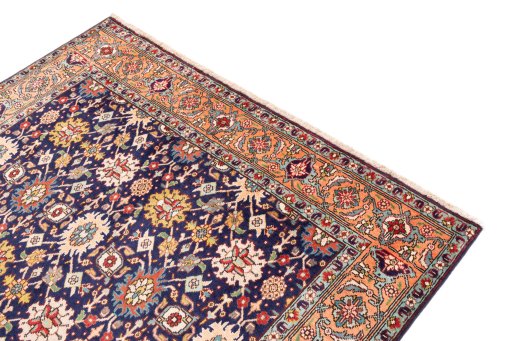 Surface texture of 1985s Tabriz rug with natural Wool and intricate pattern