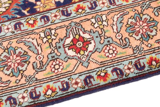 Backside of handmade 1985s Tabriz rug showing knot structure and weave density