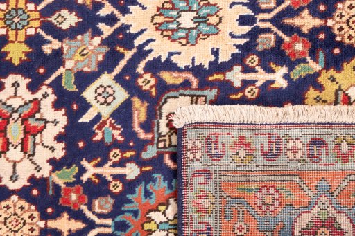 Close-up detail of 1985s Tabriz rug from Iran / Persia showing Wool weave