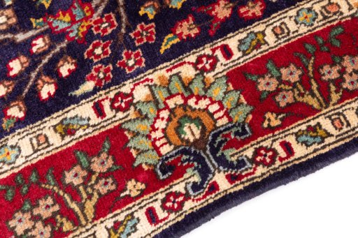Backside of handmade 2006s Tabriz rug showing knot structure and weave density